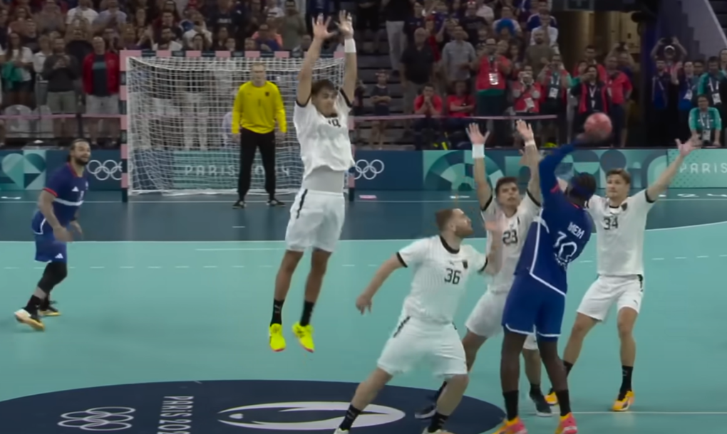 French Handball player, Dika Mem, with a bad pass at the end of regulation.